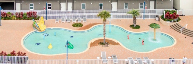 view of pool featuring a patio