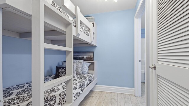 bedroom with light wood-type flooring