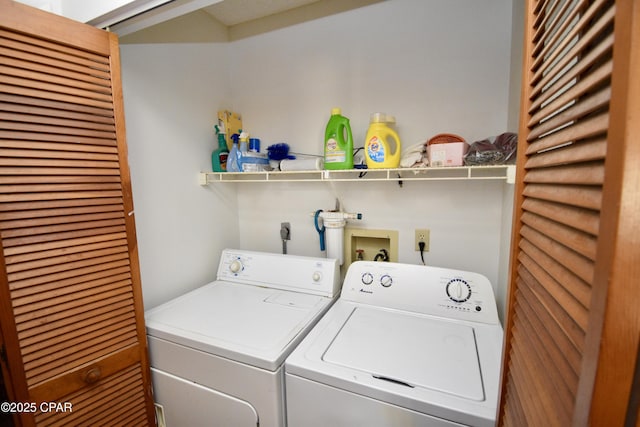 laundry room with independent washer and dryer