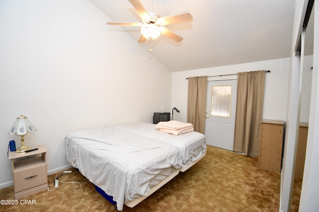 carpeted bedroom with ceiling fan and lofted ceiling