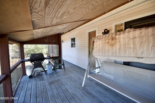 wooden terrace with area for grilling