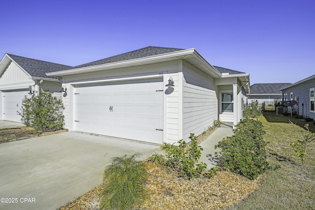 view of property exterior featuring a garage