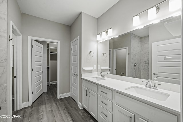 bathroom featuring vanity and hardwood / wood-style flooring