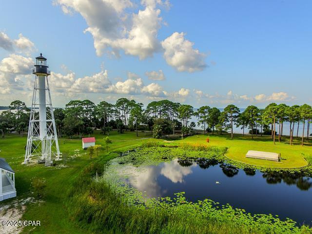 surrounding community with a water view