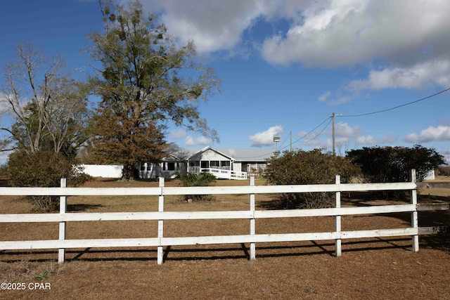 view of yard featuring a rural view