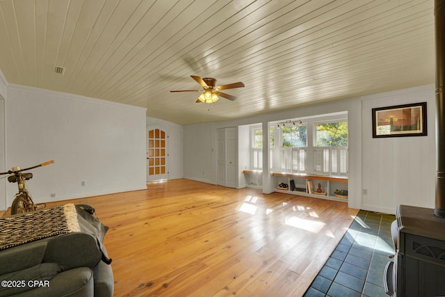 living room featuring ceiling fan, light hardwood / wood-style floors, and wooden ceiling