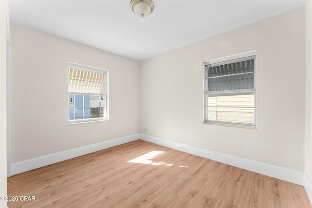 empty room featuring light hardwood / wood-style floors