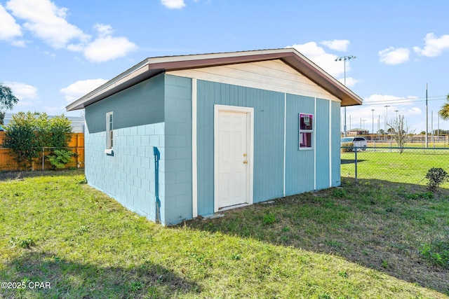 view of outdoor structure featuring a yard