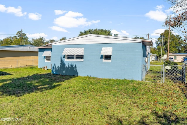 back of house with a yard