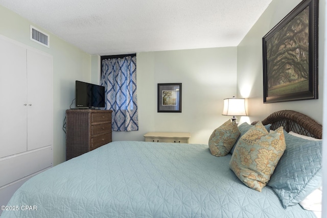 bedroom with a textured ceiling