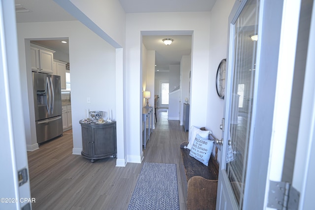 corridor featuring dark wood-type flooring