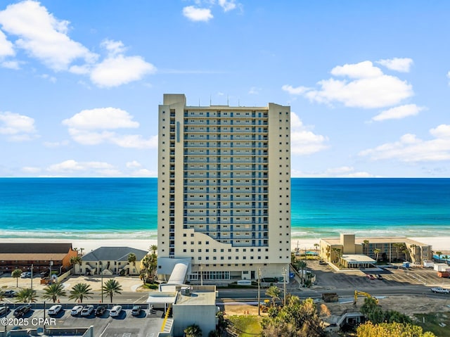 bird's eye view with a water view and a view of the beach