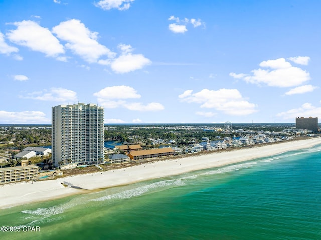 aerial view with a city view, a beach view, and a water view