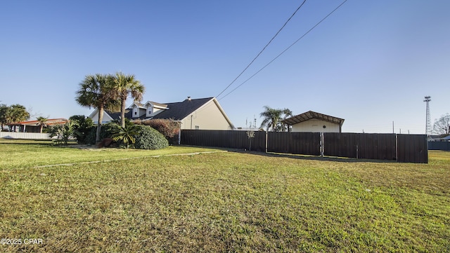 view of yard with fence