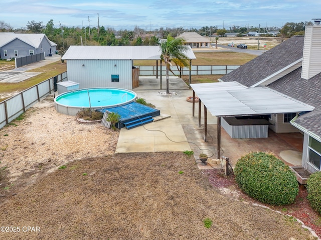 view of pool featuring a fenced in pool, a patio area, and a fenced backyard