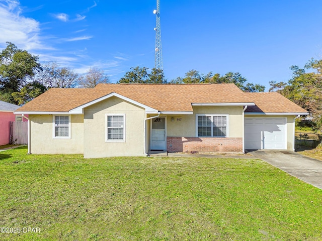 single story home featuring a garage and a front lawn