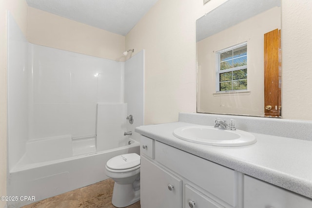 full bathroom with vanity, a textured ceiling, toilet, and shower / bath combination