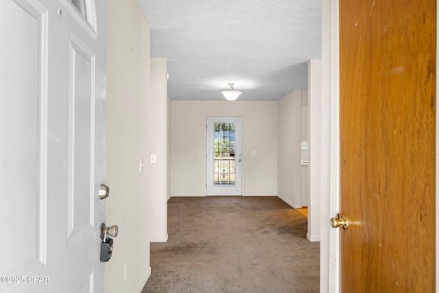 corridor featuring carpet flooring