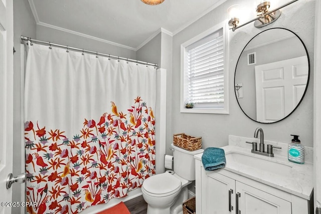 bathroom with vanity, toilet, walk in shower, and ornamental molding