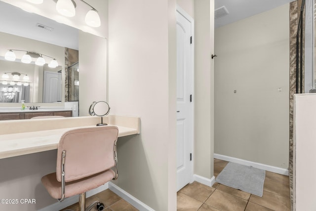 bathroom with vanity and tile patterned floors