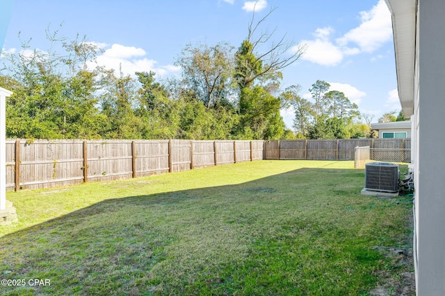 view of yard with central AC