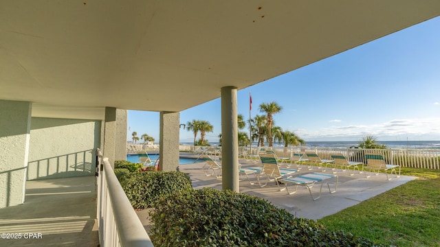 view of patio / terrace with a water view