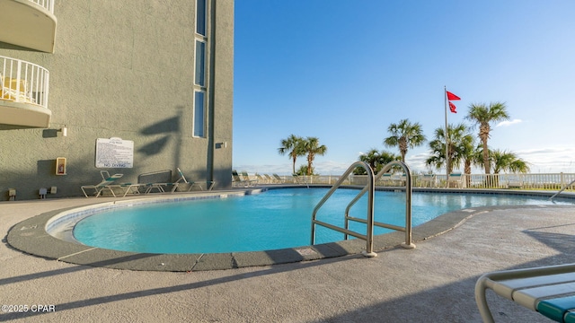 view of pool with a patio area