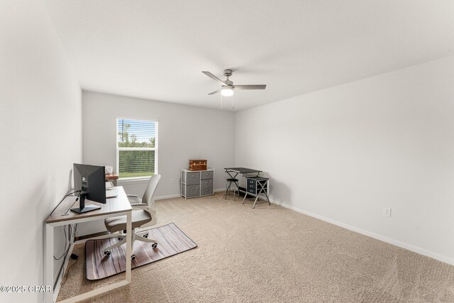 office area with carpet and ceiling fan