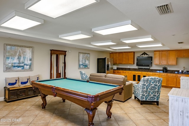 playroom with light tile patterned flooring, sink, and pool table