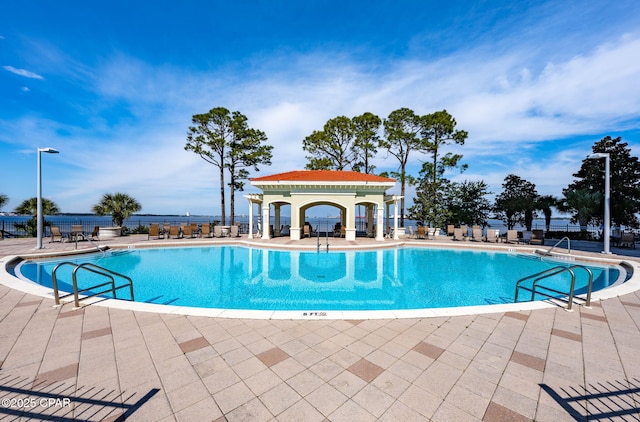 view of swimming pool featuring a patio