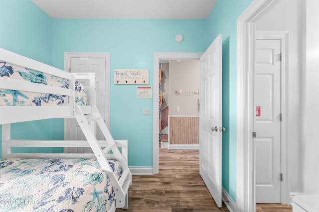 bedroom with hardwood / wood-style flooring