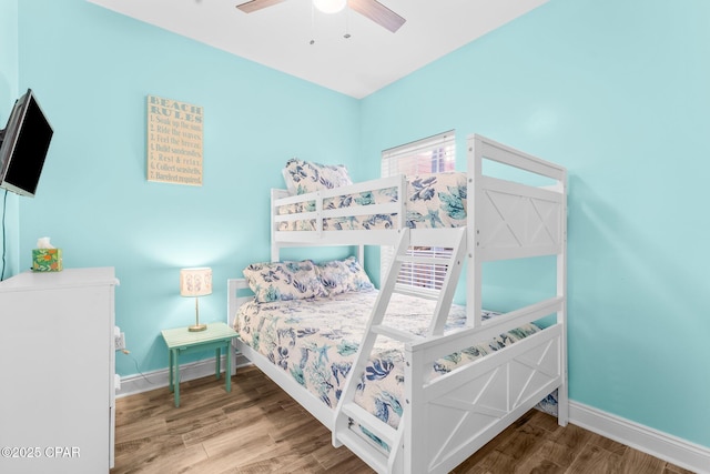 bedroom featuring wood-type flooring and ceiling fan