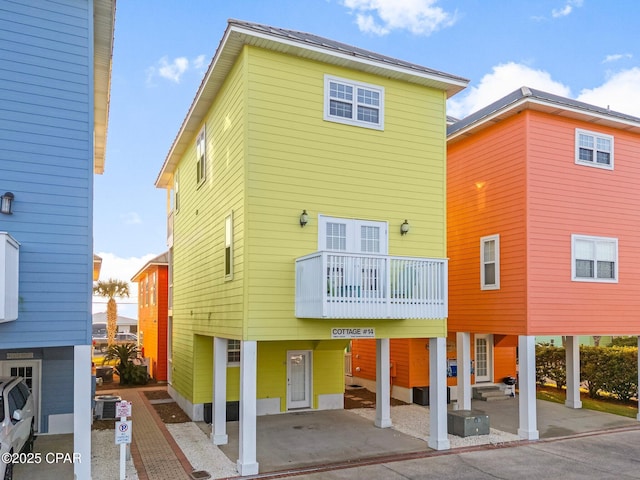 back of property with a balcony