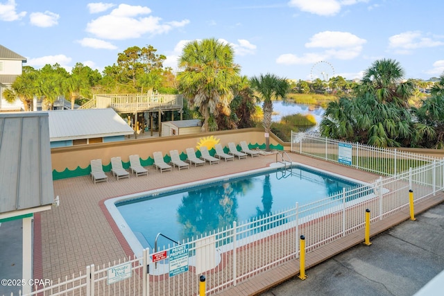 view of swimming pool with a patio