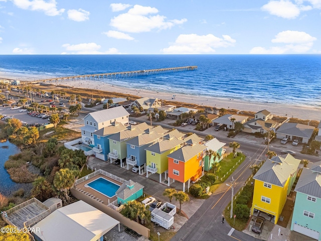 bird's eye view with a view of the beach and a water view