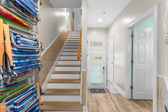 stairway featuring hardwood / wood-style floors