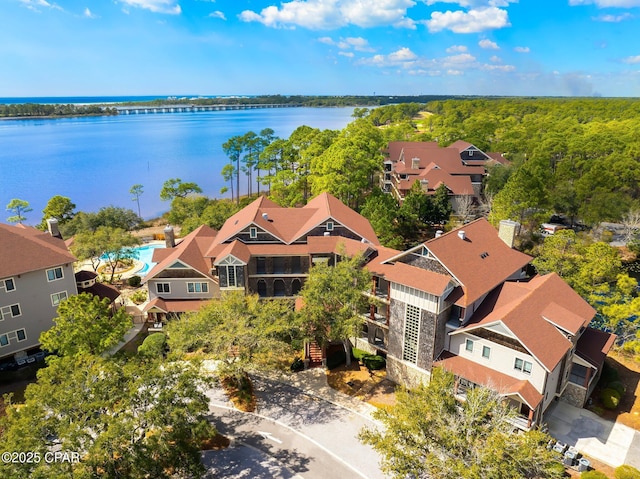 bird's eye view featuring a residential view and a water view