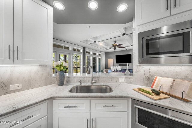 bathroom featuring shower with separate bathtub and an inviting chandelier