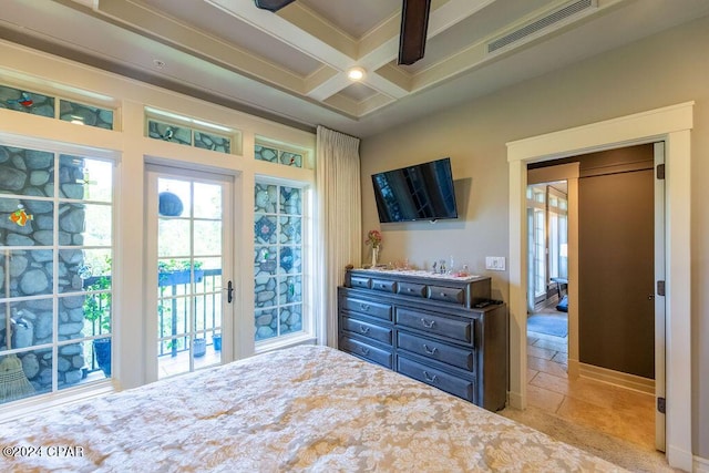 bedroom with access to outside, beamed ceiling, and coffered ceiling