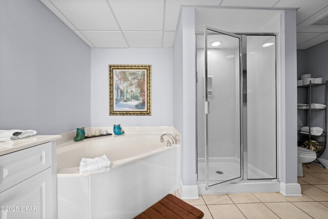 full bathroom featuring tile patterned flooring, a paneled ceiling, separate shower and tub, and vanity