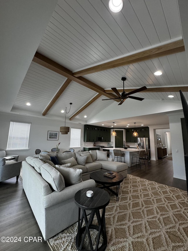 living room with ceiling fan, lofted ceiling with beams, and dark hardwood / wood-style floors