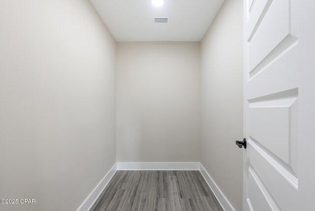 spare room featuring hardwood / wood-style floors and ceiling fan