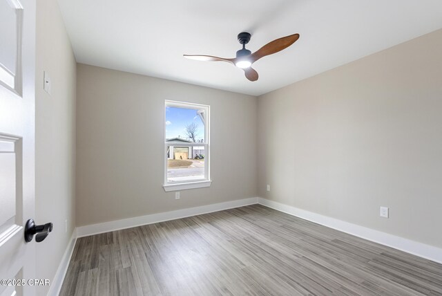 unfurnished bedroom featuring ceiling fan and light wood-type flooring