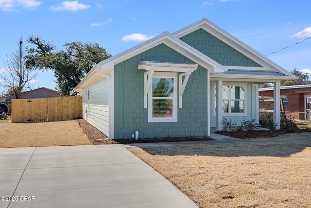 view of front of property with cooling unit