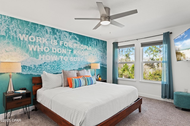 bedroom with ceiling fan and carpet floors