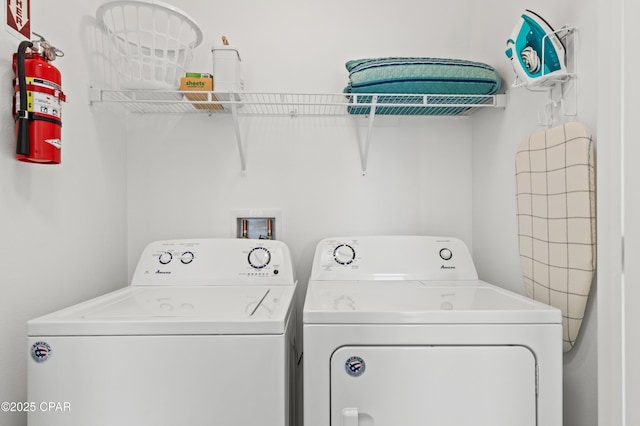 washroom with separate washer and dryer