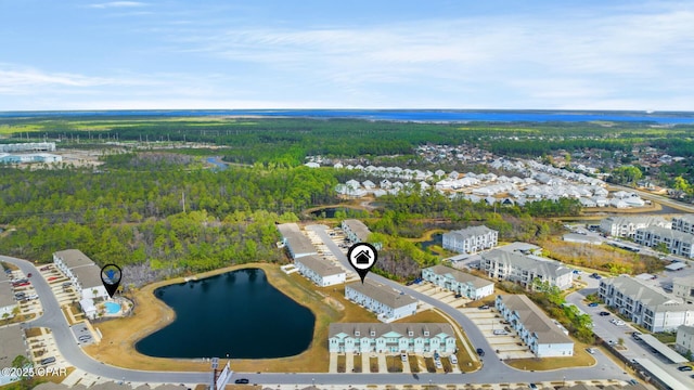 birds eye view of property featuring a water view