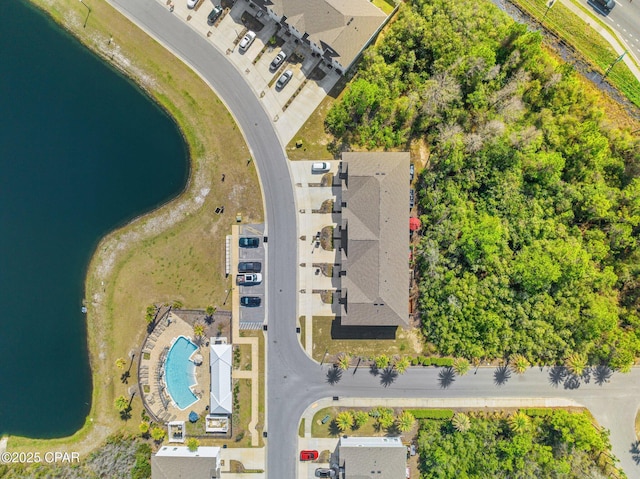 drone / aerial view with a water view