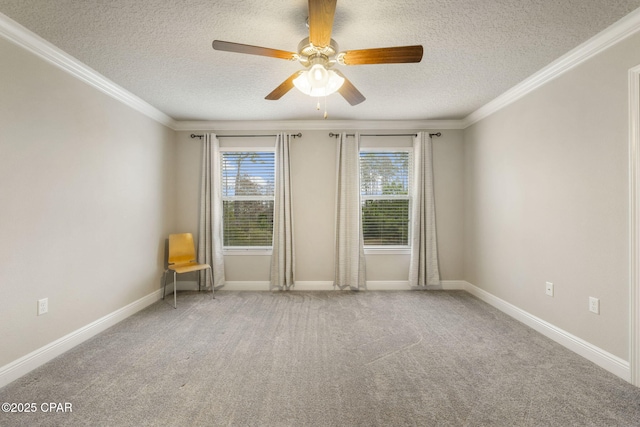 unfurnished room featuring ornamental molding, carpet flooring, and a textured ceiling