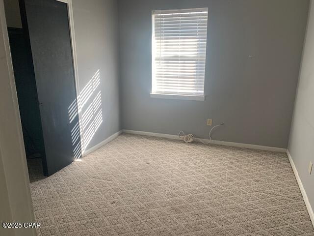 empty room with light carpet